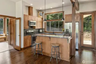 Kitchen with eating space and door to front patio