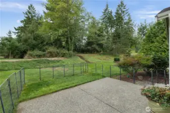 Large concrete patio and beautiful trees behind you. Enjoy the changing of the colors from your living room windows as we transition into fall.