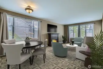 Pretty textured carpet, designer window coverings and the beautiful mantle for the electric fireplace create a lovely place to call home. Virtually staged.