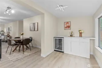 Entertaining area with beverage fridge and extra cabinet space