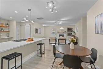 Breakfast bar features quartz slab countertops