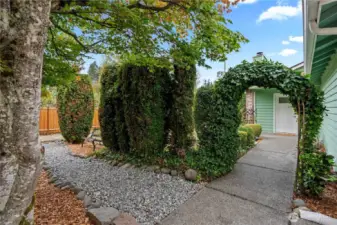 Arched trellis adds charm and a welcoming touch to your outdoor space
