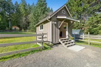 Heated bonus studio adds flexible, year-round space just off the north pasture, ideal for a studio, office, or hobby workspace. Set within the fenced equestrian area, it offers convenient functionality while keeping you close to the day-to-day rhythm of the property.