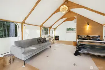 Inside the “Seahawk” and “Raven” Nests, identical safari-style interiors offer a cozy, well-designed retreat with soaring canvas ceilings, warm wood accents, and inviting lounge space. Each is individually heated and thoughtfully appointed. Perfect for comfortable guest stays or a private escape overlooking the property