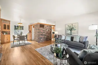 Once inside you are greeted by freshly refinished stunning oak hardwood floors and open living spaces.