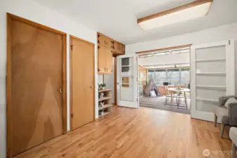 Family room with sitting area, 3/4 bath looking into SunRoom.