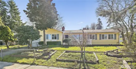 One car garage with lots of storage, work bench and more