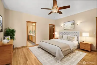 Virtually staged. Large masterbed with access to back patio to enjoy the bubbling hot tub.