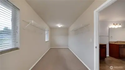 Large walk in closet in th primary suite is nearly the size of a bedroom.  Huge!