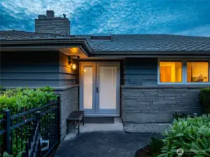 The home features a tastefully-designed gated front entry.