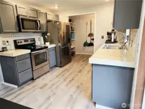 Kitchen just steps from the yard for the yard parties.
