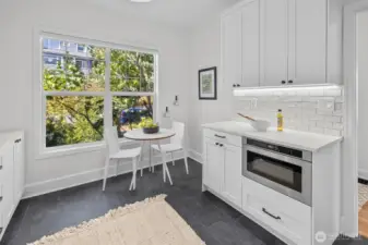 Coffee bar with breakfast table options.