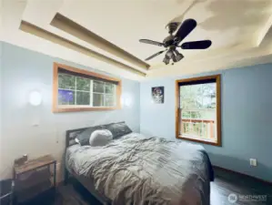 Bedroom: LPV flooring, built ins, ceiling fan, tray ceiling, views of the Columbia River