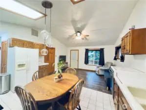 Dine in Kitchen: refrigerator, stove, dishwasher, plenty of cabinets, tile