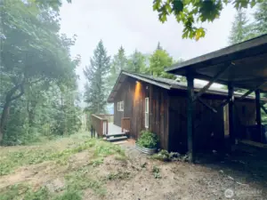 Circle driveway, home with views of the Columbia River, unfinished basement, full length deck, carport