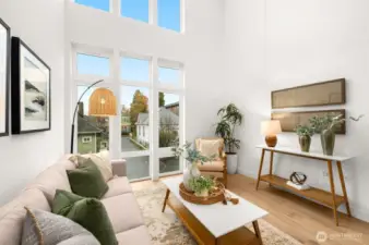 Cozy up on the couch to watch a movie, or host a dinner party - your guests will be wow'd with floor-to-ceiling windows in this vaulted space!