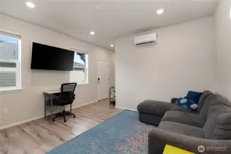Main-level apartment-style guest suite. The doorway is an exterior entrance.