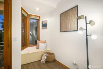 The cozy nook is a great place to read, relax or work.