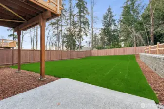 Deck provides coved outdoor living opportuntity.