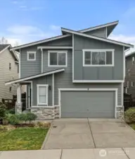 Welcoming exterior in the desirable Bridges community with charming curb appeal and a beautifully maintained presence.