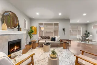 Cozy gas fireplace anchors the living space and adds warmth and charm year-round.