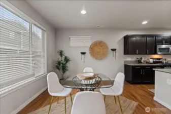 Bright and open dining space perfectly positioned off the kitchen for easy entertaining.
