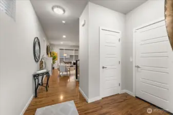 Bright and inviting entryway that sets the tone for this thoughtfully designed home.