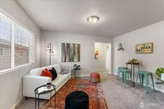 Versatile upstairs loft ideal for a media room, home office, or play space.