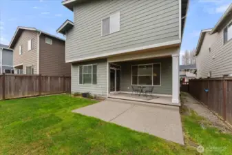 Covered patio for year-round outdoor enjoyment.
