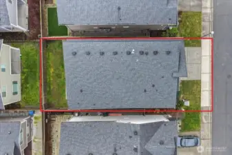 Aerial shot of this home and it's easy to manage yard.