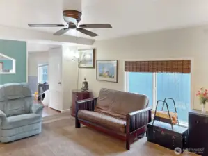 Living room with ceiling fan.