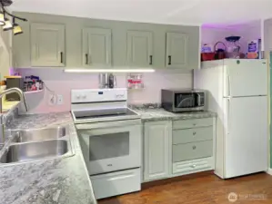 Kitchen with newer appliances.