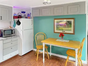 Kitchen with lots of cabinet space and room for kitchen eating space.