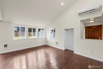 Living area with vaulted ceilings