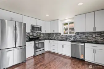 Luxurious kitchen with stainless appliances