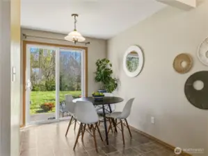 Dining looks out to large back yard