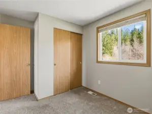 Looks out to beautiful yard