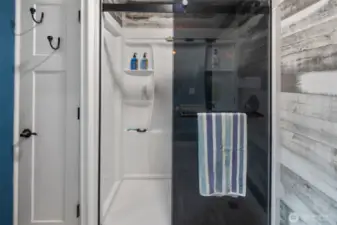 You've also got a beautiful sliding glass door on your shower.