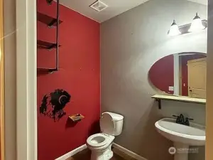 Convenient Powder Room: Essential Functionality on the Main Level.