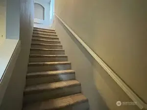 Stairs to Loft: Ascend to Flexible Living Space.