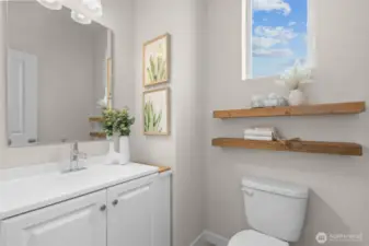 1/2 bath on main living floor adjacent to the kitchen