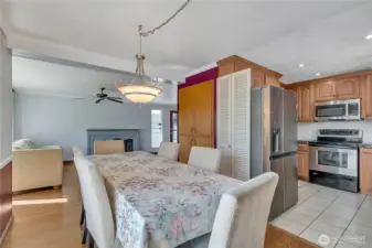 Kitchen flows to dining room and large deck.