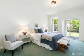Primary suite also includes sliding glass door access to rear patio.