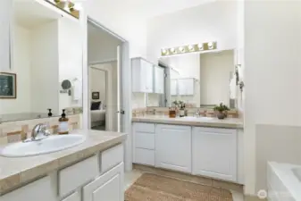 Dual sinks and vanities in Primary suite.