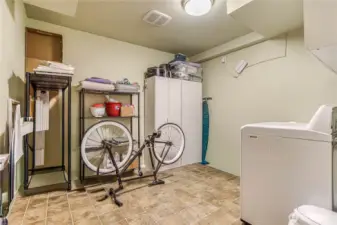 Laundry and storage area for downstairs
