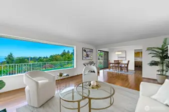 Adjacent to the living room, the formal dining room shares the view.