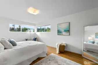 Corner windows in the largest of three bedrooms for Eastern and Southern exposure.