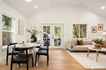 The spacious dining area can easily accommodate the largest of dinner parties. The french doors flow out onto the new composite deck and paver patio.