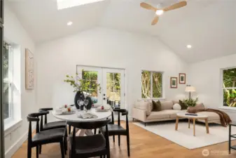 An overhead skylight adds to the natural light and a new designer ceiling fan is both functional and beautiful.