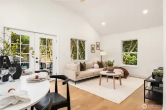 Looking across towards the spacious living room showcases the space and privacy that this home affords.